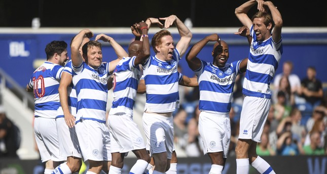 Stars from the entertainment and sports worlds have played a soccer match in London to benefit victims of the Grenfell Tower fire that claimed more than 80 lives in June. (AP Photo)