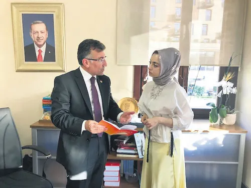 Abdullah Güler, left, and Daily Sabah's Şeyma Nazlı Gürbüz.