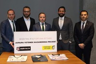 Beu015fiktau015f and Fortuna Sittard officials pose after the signing in Istanbul, Jan. 9, 2020. (AA Photo)