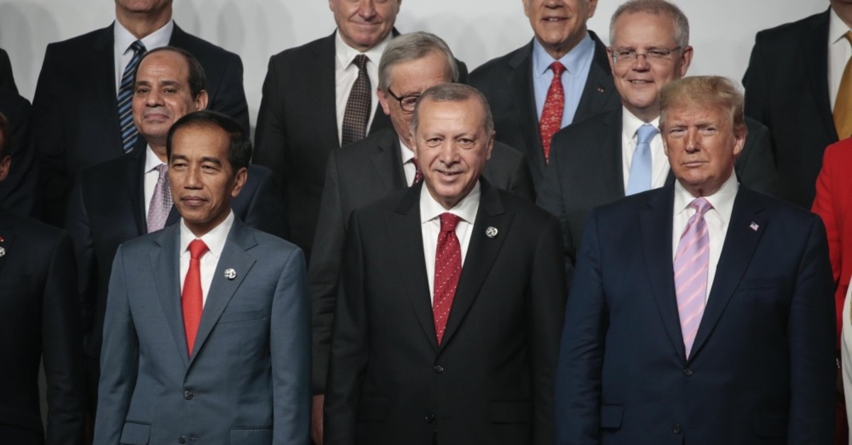 President Erdou011fan poses with U.S. President Donald Trump at G20 leaders summit in Osaka, Japan, June 28, 2019.