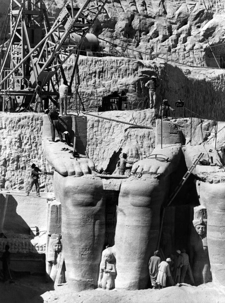 Egyptian workers dismantling Ramses II statues to be moved to the new site of the twin temples of Abu Simbel.