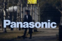 A man is reflected on Panasonic Corp's logo at Panasonic Center in Tokyo, Japan, February 2, 2017. (Reuters Photo)