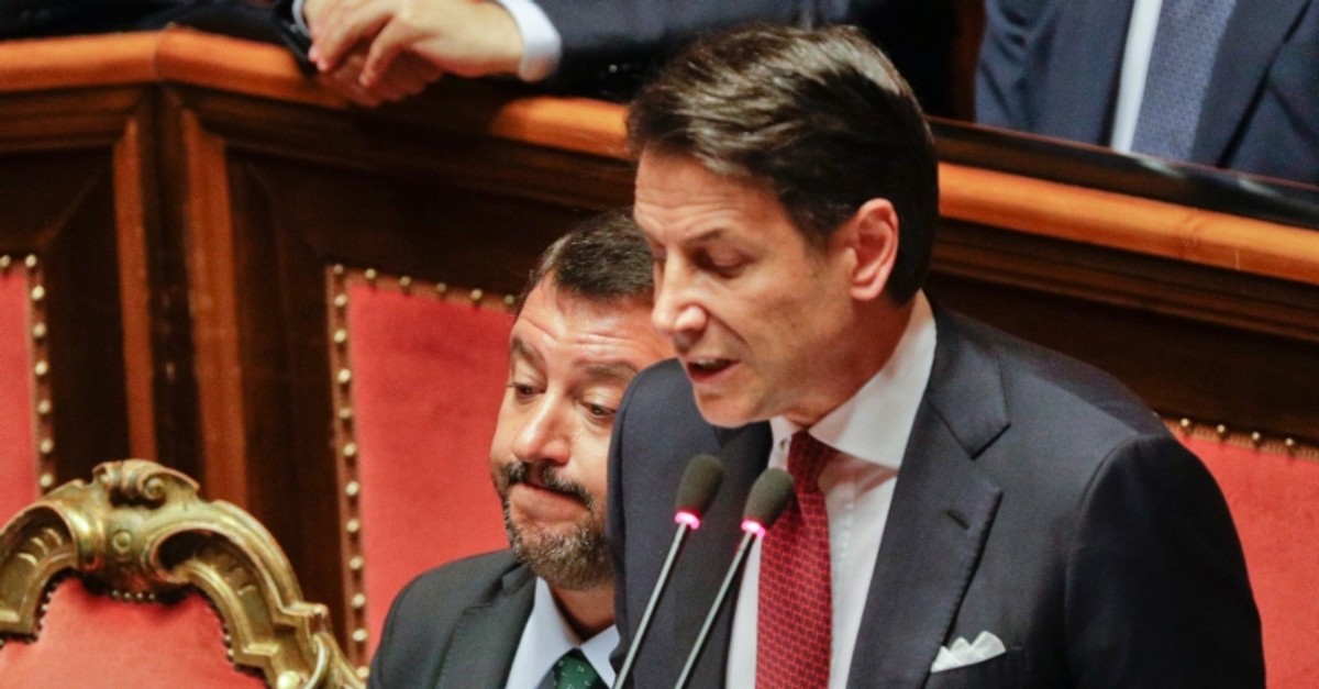 Italian Premier Giuseppe Conte, right, is flanked by Deputy-Premier Matteo Salvini as he addresses the Senate in Rome, Tuesday, Aug. 20, 2019. (AP Photo)