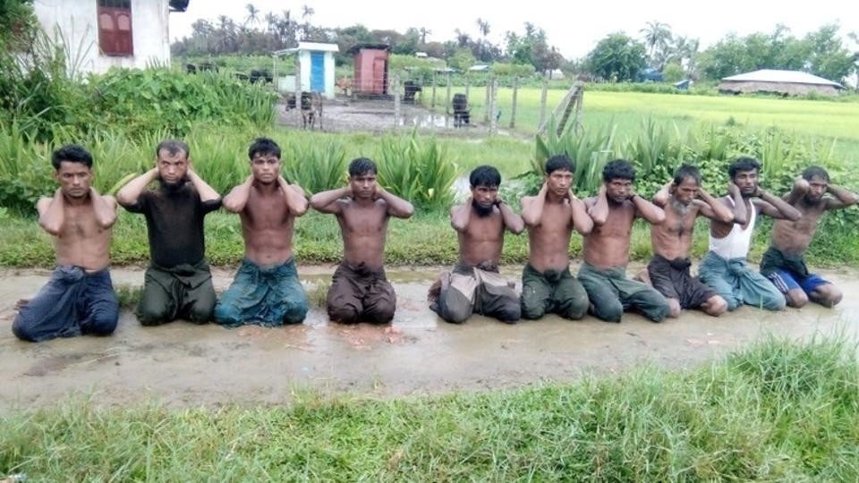 Ten Rohingya Muslim men with their hands bound kneel in Inn Din village September 1, 2017. (REUTERS Photo)