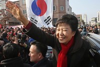Ex-South Korean president Park Geun-hye waves to supporters during her election campaign rally in Hwaseong, south of Seoul, South Korea, Dec. 17, 2012. (AP Photo)