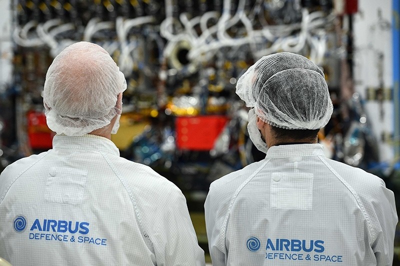 Media look at part of the Eutelsat Quantum satellite, billed as the first commercial satellite to be fully configurable in orbit, at Airbus Space and Defence in Portsmouth, southern England (AFP Photo)