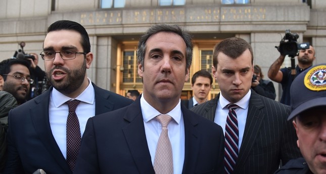 In this file photo taken on April 26, 2018 US President Donald Trump's personal lawyer Michael Cohen(C) leaves the U.S. Courthouse in New York on April 26, 2018. (AFP Photo)