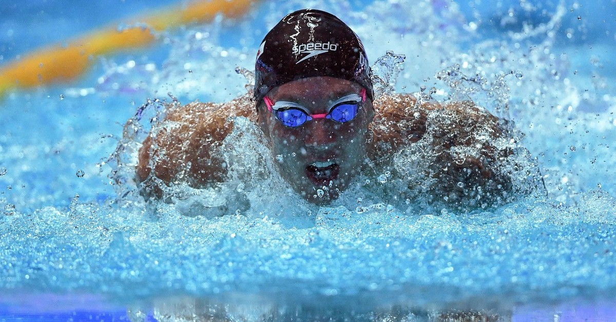 Dressel competes in the final of the menu2019s 100m butterfly event, July 27, 2019. 