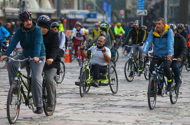 Cyclists tour Izmir on Dec. 2, 2018, to raise awareness on International Day of Persons with Disabilities. (AA Photo)