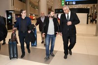 Hilmi Balcu0131 was greeted by Anadolu Agency officials upon his arrival at Istanbul Airport, Jan. 17, 2020. (AA Photo)
