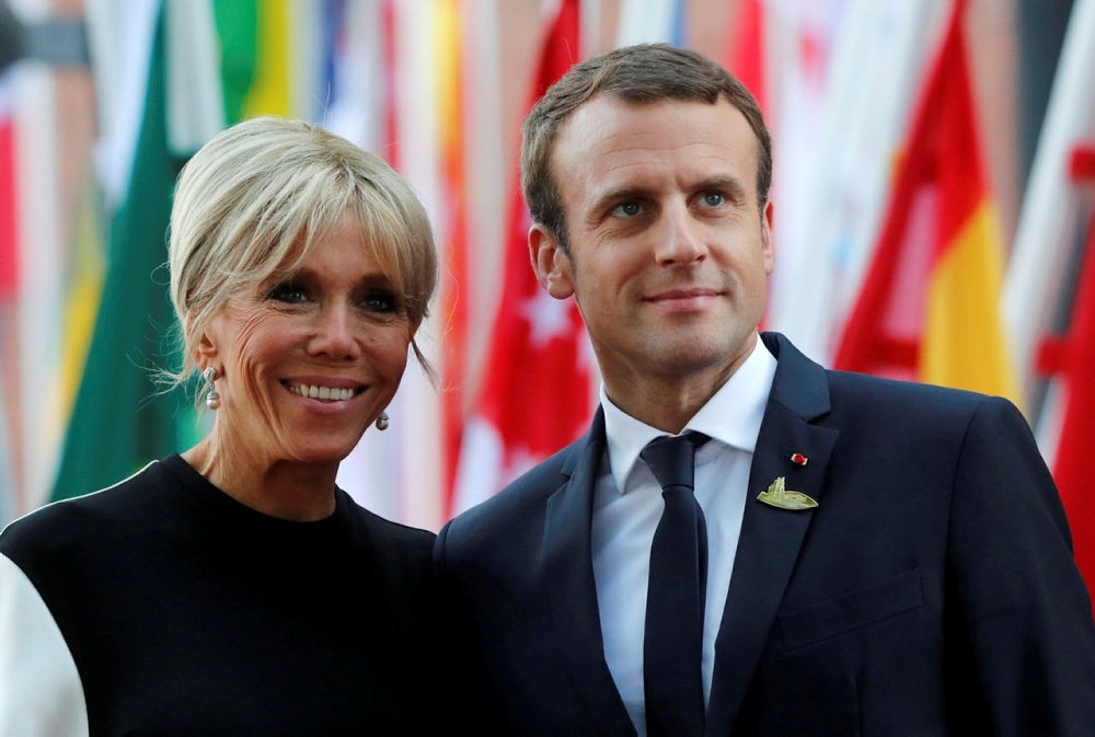 French President Emmanuel Macron and hiw wife Brigitte Macron are seen July 7, 2017 at the G20 summit in Hamburg, Germany.   Picture taken July 7, 2017. (Reuters Photo)