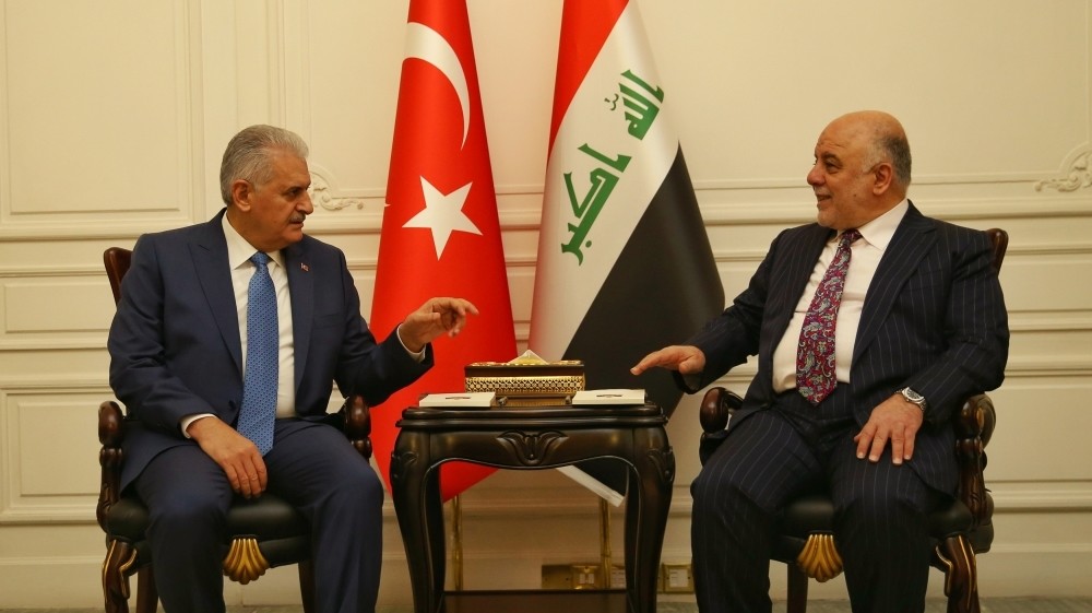 Turkey's Prime Minister Binali Yu0131ldu0131ru0131m met his Iraqi counterpart Haider al-Abadi in Baghdad on January 8, 2017. (Reuters Photo) 