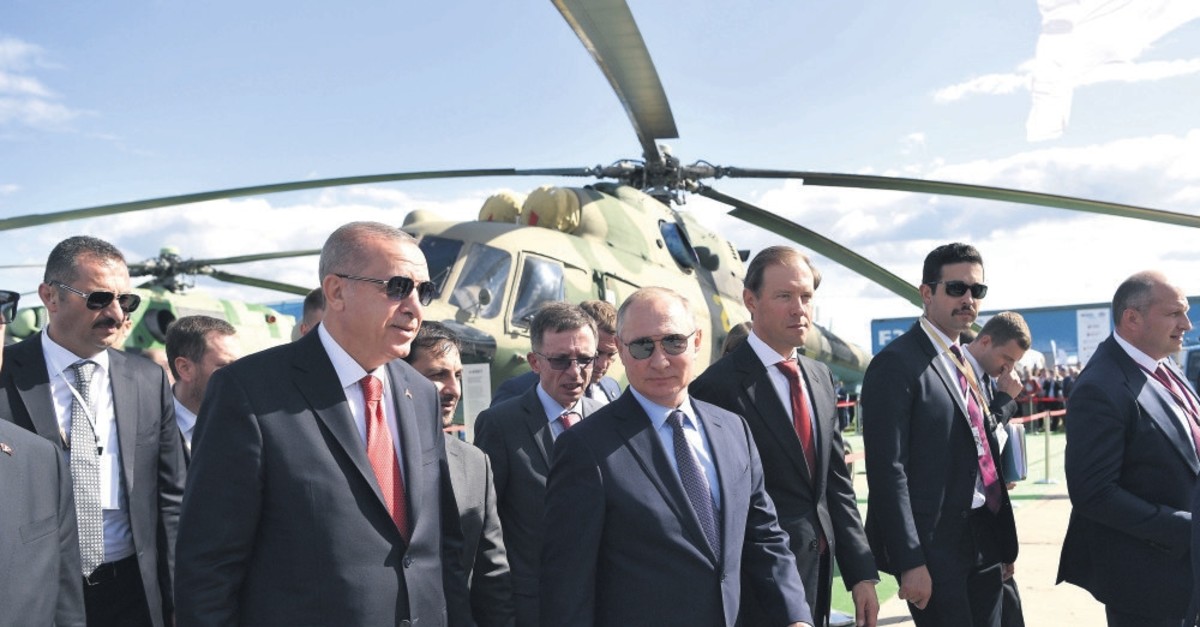 President Recep Tayyip Erdou011fan and Russian President Vladimir Putin (R) visit the MAKS 2019 air show in Zhukovsky, outside Moscow, Russia, Aug. 27, 2019.