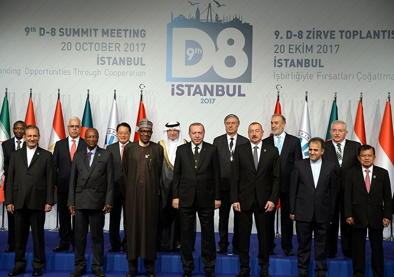 President Erdou011fan (center) posing for a group photo with leaders attending the D-8 Summit in Istanbul, Oct. 20, 2017 (DHA Photo)