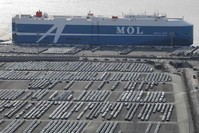 This Feb. 6, 2020, photo shows rows of Hyundai cars parked for shipping in the southeastern port of Ulsan, South Korea. (Yonhap via AFP)
