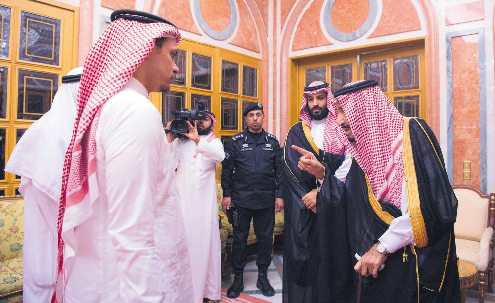 Saudi King Salman (R) and Crown Prince Mohammed bin Salman (2-R) meet with the son of murdered Saudi journalist Jamal Khashoggi, in Riyadh, Saudi Arabia, Oct. 23.