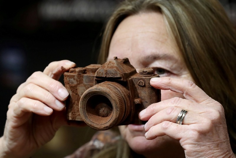 A photo camera made of chocolate is seen at the