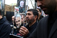 Iranians gather to mourn Gen. Qassem Soleimani, head of the elite Quds Force, who was killed in an air strike at Baghdad airport, in Tehran, Iran, Jan. 4, 2020. (West Asia News Agency via Reuters)