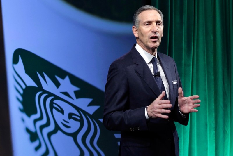 In this Dec. 7, 2016, file photo, Starbucks Chairman and CEO Howard Schultz speaks during the Starbucks 2016 Investor Day meeting in New York. (AP Photo)