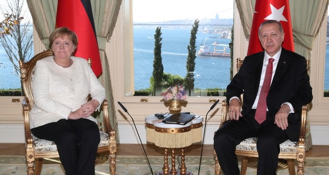 أردوغان يجري لقاءات ثنائية مع ميركل وبوتين وماكرون قبيل القمة الرباعية