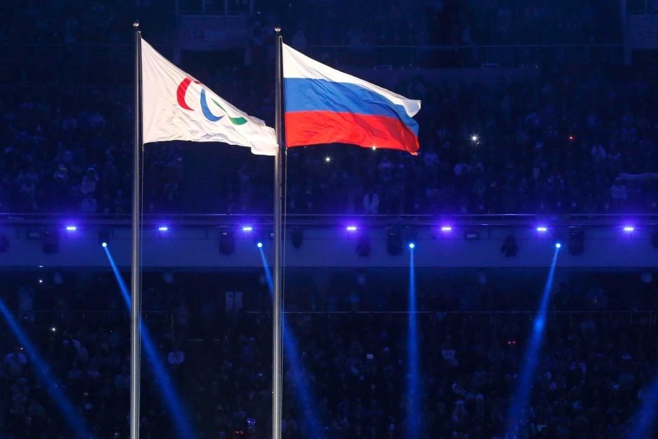 The Paralympic and Russian flags fly side by side at the Sochi Winter Olympics opening ceremony. (REUTERS Photo)