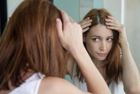 If you are seeing new grays sprouting, it could be due to extreme stress. (iStock Photo)