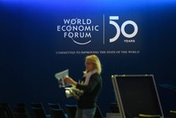 A staff member prepares translators in the Congress Center ahead of the annual meeting of the World Economic Forum (WEF), Davos, Jan. 20, 2020. (AFP Photo)
