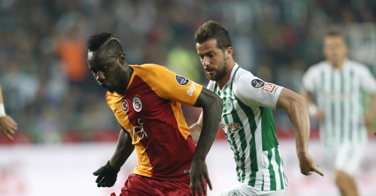Galatasaray's Diagne chased by Konyaspor's Jahovic in Su00fcper Lig game, April 29, 2019.