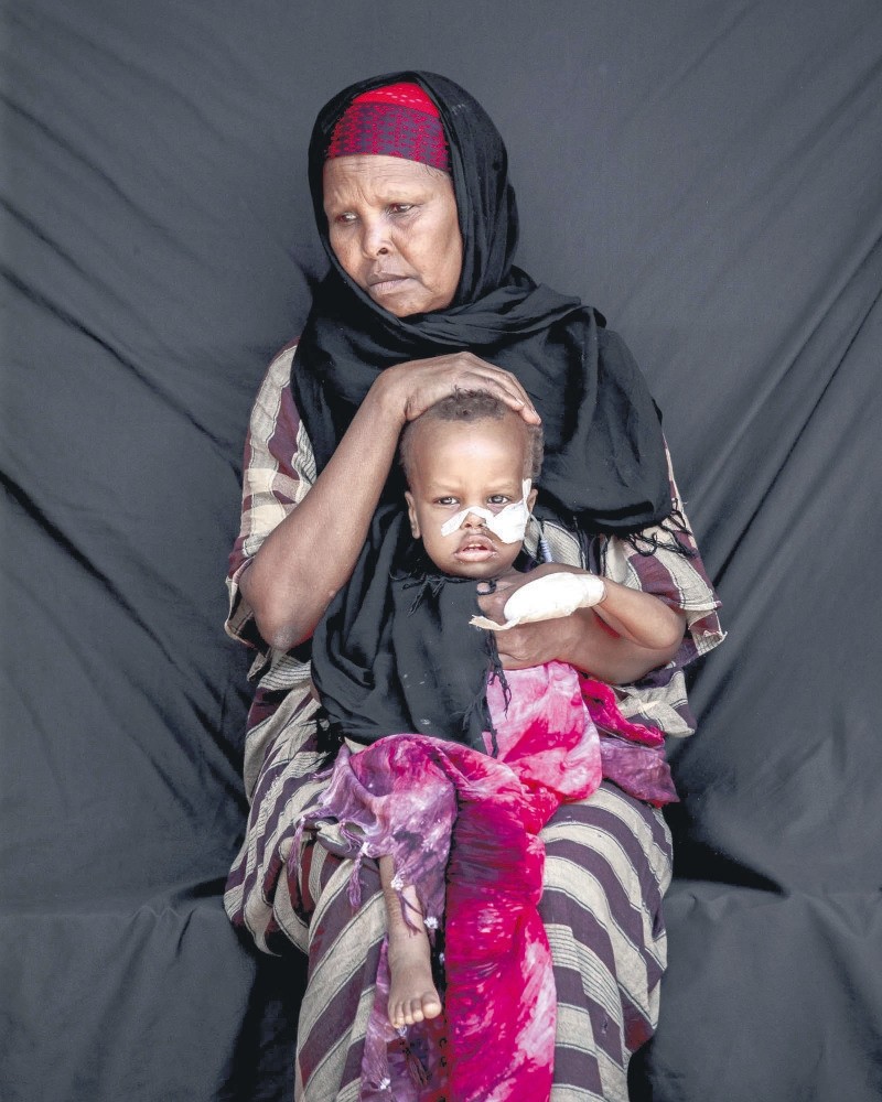 Faduma Saad Abukar with her son Anas. The two traveled to the hospital from their village hit by drought-related diseases.