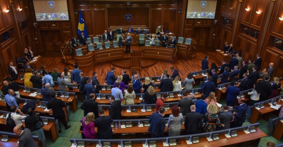 Kosovo's lawmakers leave the chamber after voting to disband the parliament during an extraordinary session in the capital Pristina, Thursday, Aug. 22, 2019 (AP Photo)