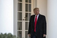 President Donald Trump walks with Greek Prime Minister Kyriakos Mitsotakis, not pictured, along the Colonnade of the White House, Tuesday, Jan. 7, 2020, in Washington. (AP Photon)