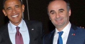 This undated file photo shows Barack Obama with Kemal Öksüz in an event.