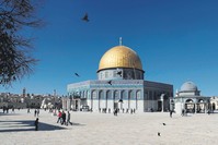 Palestinian Muslim worshippers walk past the Dome of the Rock at the Al-Aqsa Mosque compound in Jerusalemu2019s Old City after U.S. President Trumpu2019s decision to recognize Jerusalem as the capital of Israel.