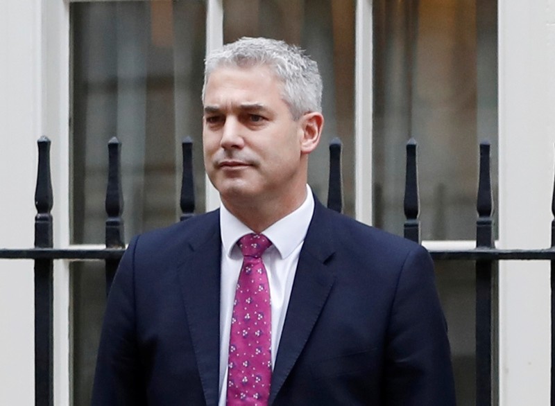 In this file photo dated Wednesday, Nov. 22, 2017, Economic Secretary to the Treasury Stephen Barclay poses outside 11 Downing Street in London. (AP Photo)