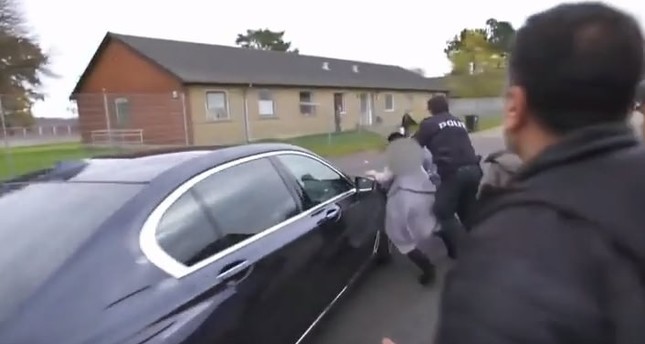 A screenshot from the video published by DR shows the refugee woman being hit by the minister's car.