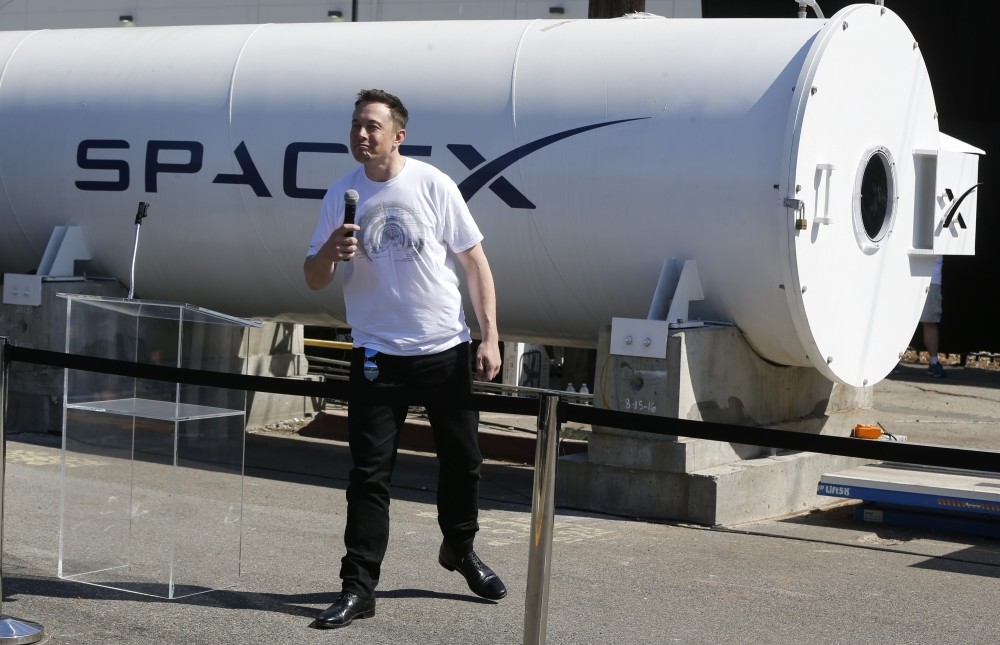 Telsa CEO Elon Musk congratulates the teams of the Hyperloop Pod Competition II at SpaceX's Hyperloop track in Hawthorne, California. 