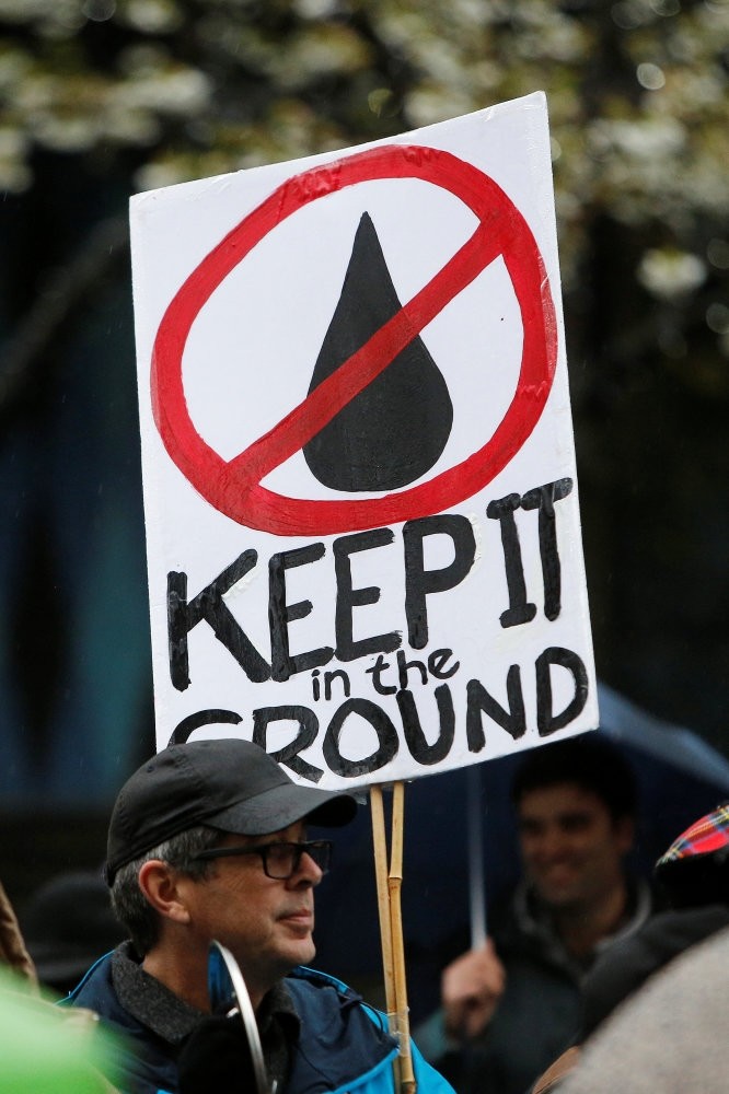 Opponents of the oil pipeline protest outside a Liberal Party fundraising event in Vancouver.
