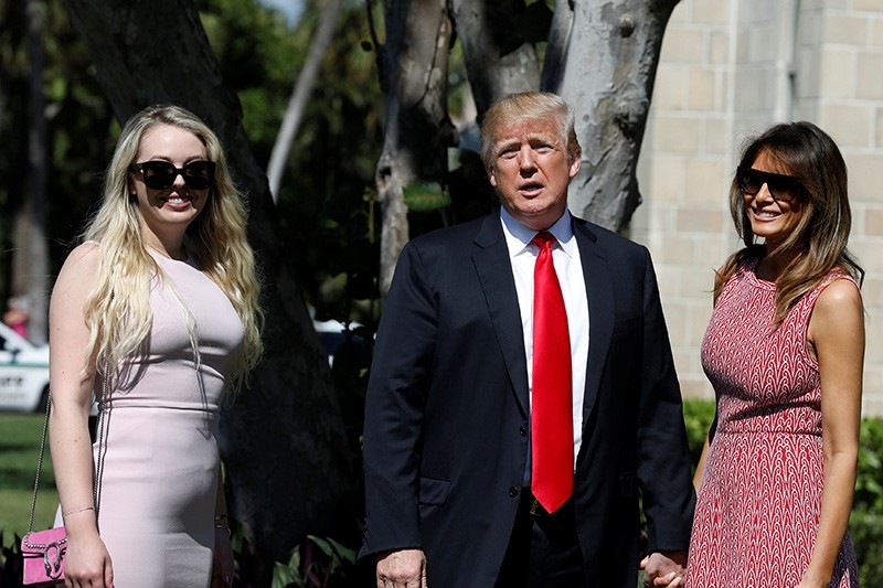 U.S. President Donald Trump talks to reporters about DACA as he arrives with first lady Melania Trump and daughter Tiffany for the Easter service at Bethesda-by-the-Sea Episcopal Church in Palm Beach, Florida, U.S., April 1, 2018. (Reuters Photo)