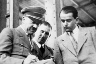 Adolf Hitler, (L), discusses plans for building a convention hall at Nuremberg with Lord Mayor Willy Liebel, (C), and Professor Albert Speer, (R), at Nuremberg, Germany.  