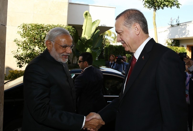 Turkish President Recep Tayyip Erdou011fan shakes hands with Indian Prime Minister Narendra Modi during G20 Summit 2015 in Turkey's Antalya.