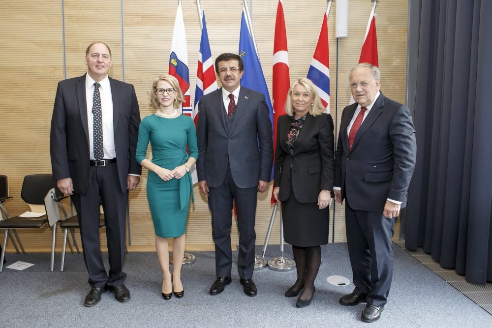 Economy Minister Nihat Zeybekci (C) attended a meeting on the revision of Turkey-EFTA FTA in Geneva on Friday.