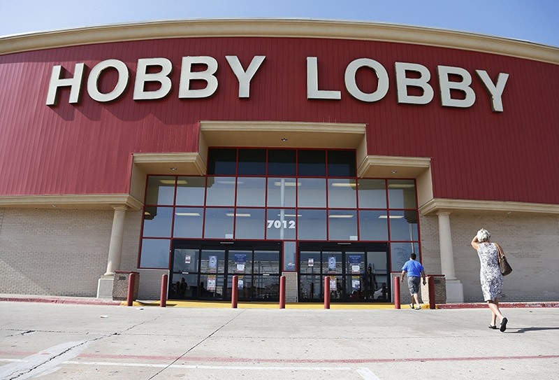 - In this June 30, 2014, file photo, customers walk to a Hobby Lobby store in Oklahoma City (AP Photo)