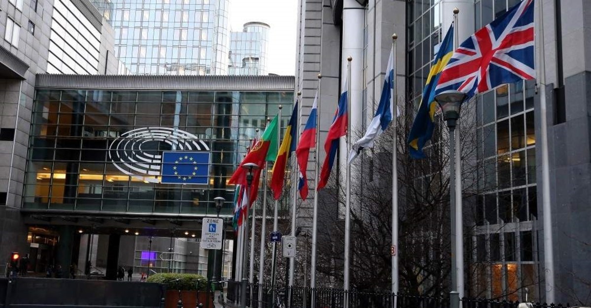 Flags pictured in front of the European Parliament in Brussels. (AA Photo)
