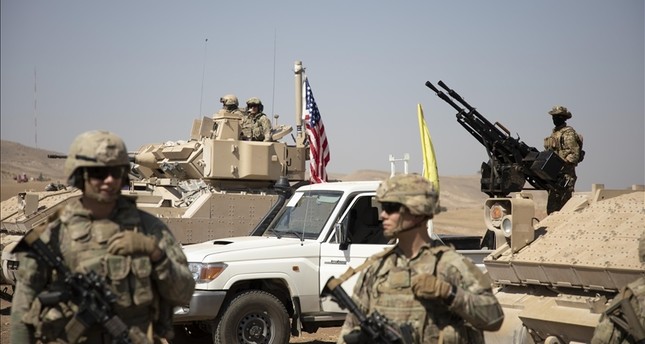 قوات أمريكية تدرب عناصر من تنظيم واي بي جي الإرهابي في شرقي سوريا صورة: الأناضول
