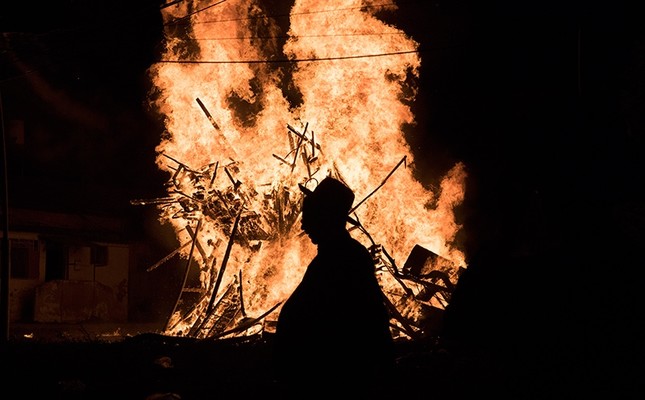 Ultra Orthodox Jews dance around a large bonfire in the neighborhood of Mea Shearim in Jerusalem, Israel (EPA Photo)