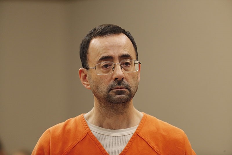 Dr. Larry Nassar, 54, appears in court for a plea hearing in Lansing, Mich. (AP Photo)
