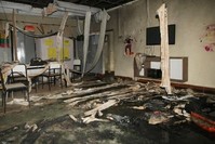 Remains of the nursery burnt down in Brazil's Janauba city (AFP Photo)