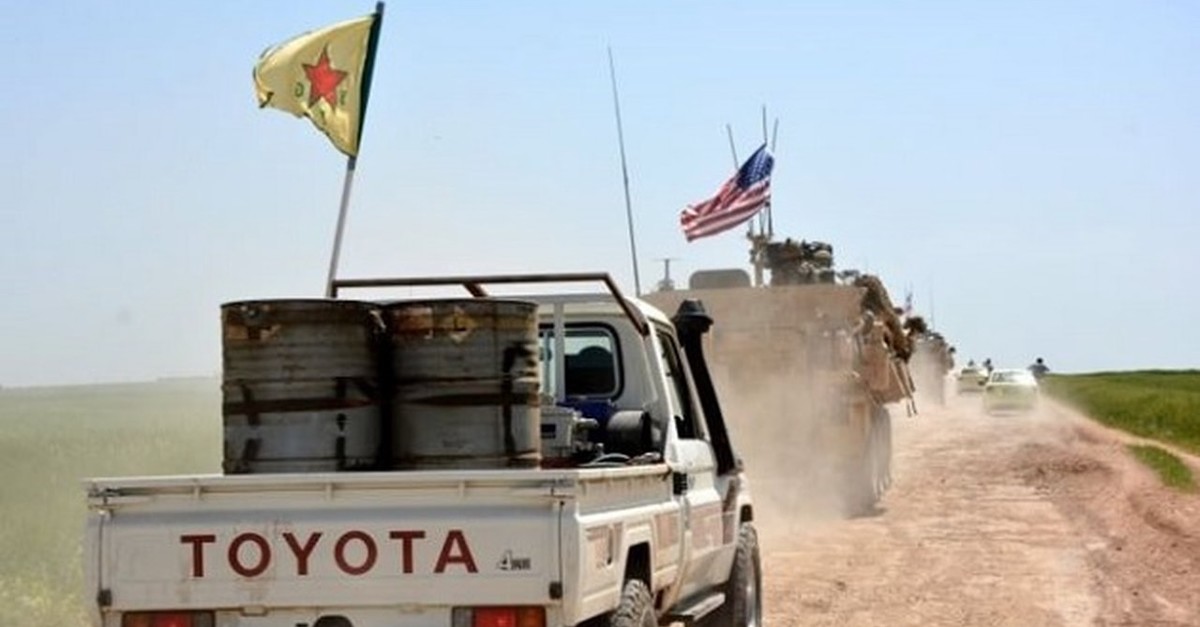A convoy of U.S. army troops and YPG terrorists patrol close to the al-Ghanamya village, near the Syrian-Turkish border, Syria, April 29.