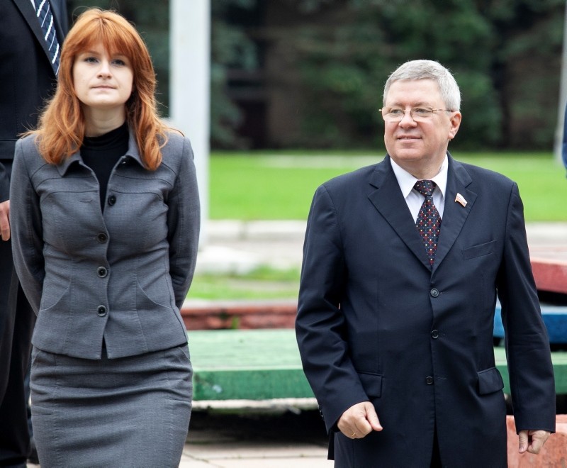 In this photo taken on Friday, Sept. 7, 2012, Maria Butina walks with Alexander Torshin then a member of the Russian upper house of parliament in Moscow, Russia. (AP Photo)