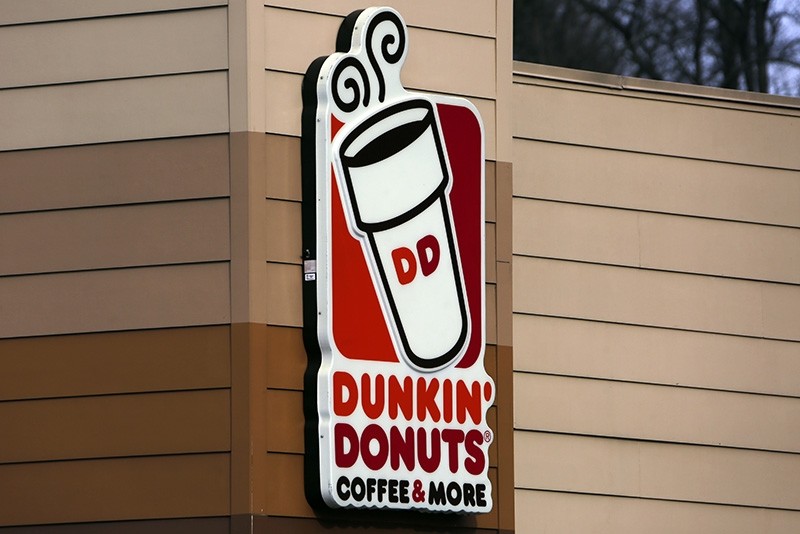 This Jan. 22, 2018, file photo shows a Dunkin' Donuts sign on a shop in Mount Lebanon, Pa. (AP Photo)